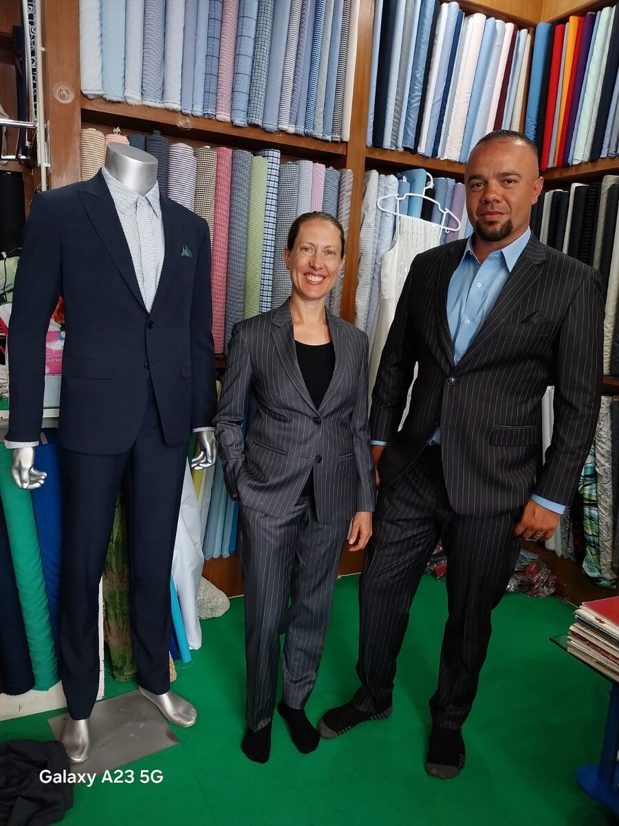 Customer in tailored navy suit