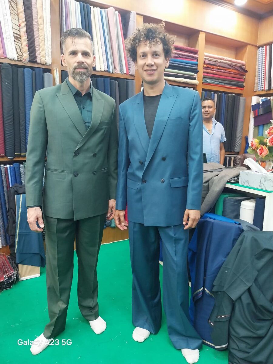 Father and son in matching suits